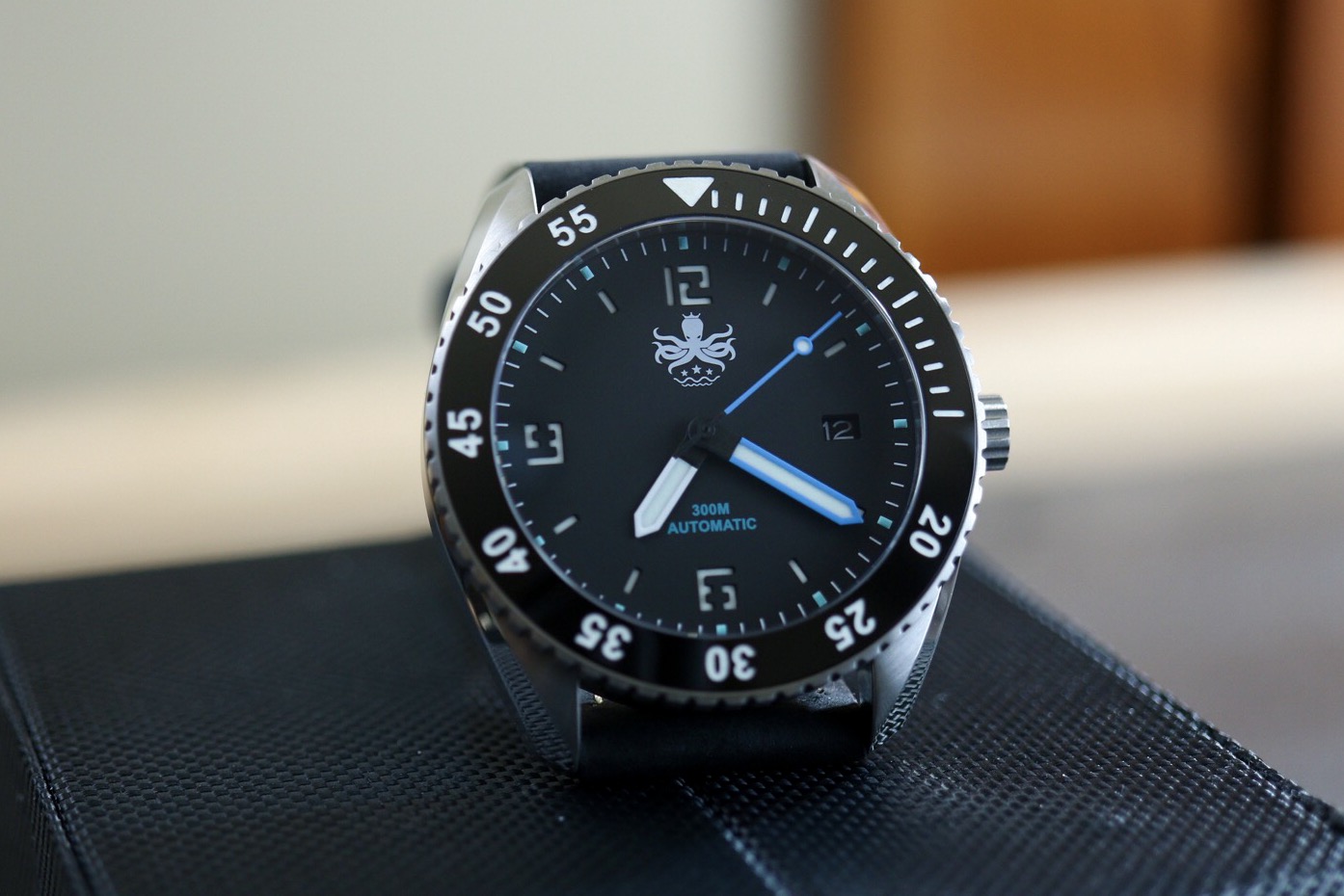 Octopus logo top watch